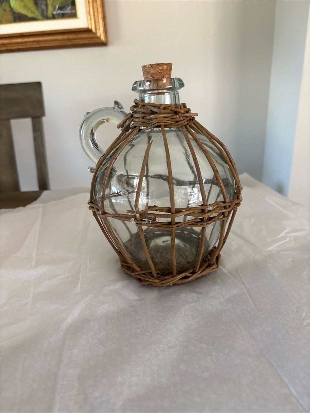 Italian Vintage glass bottle vase with a woven rattan or wicker cove